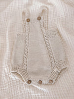 Load image into Gallery viewer, Newborn knitted romper with cable knit pattern „layal&quot;
